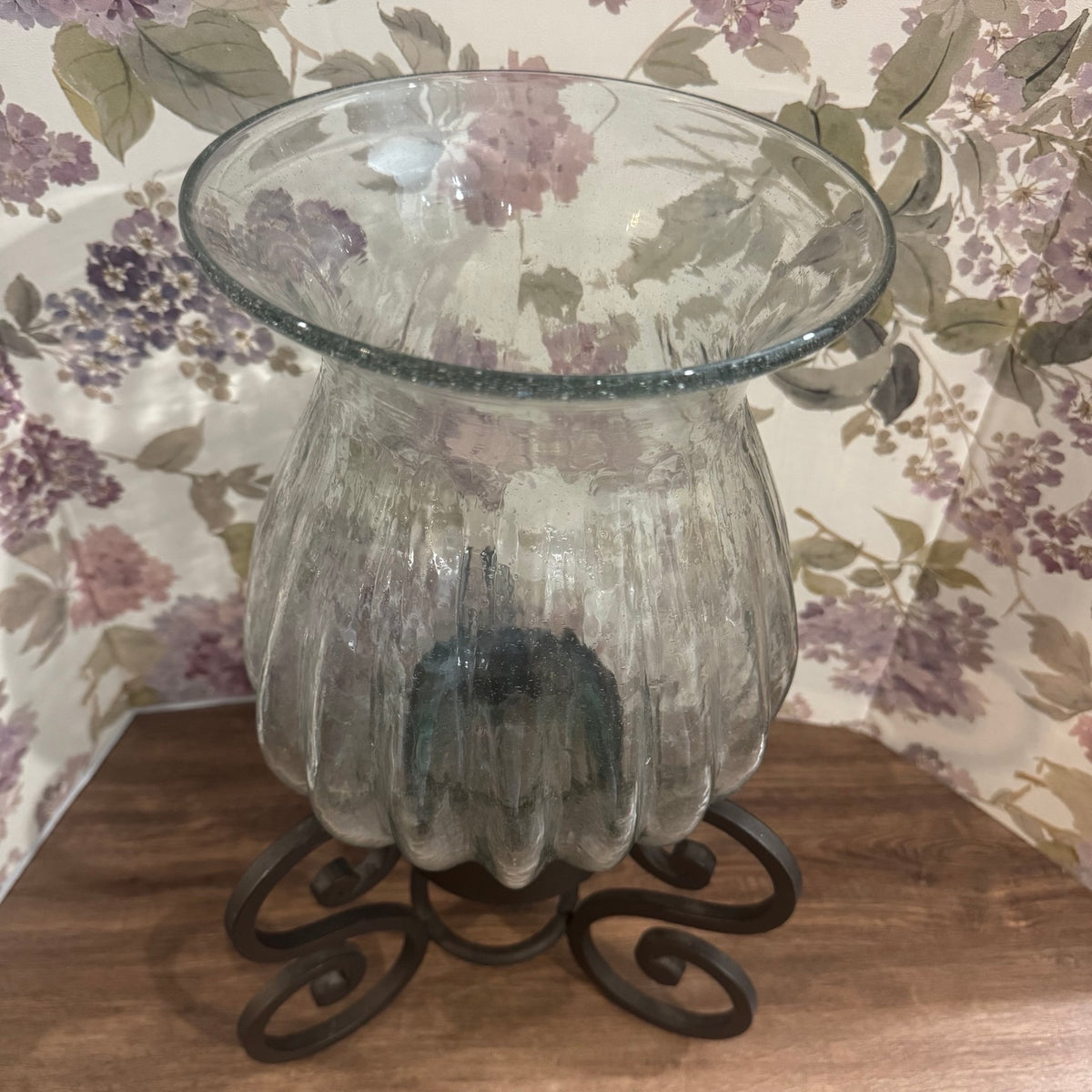Large Glass Hurricane Vase on Wrought Iron Scroll Stand