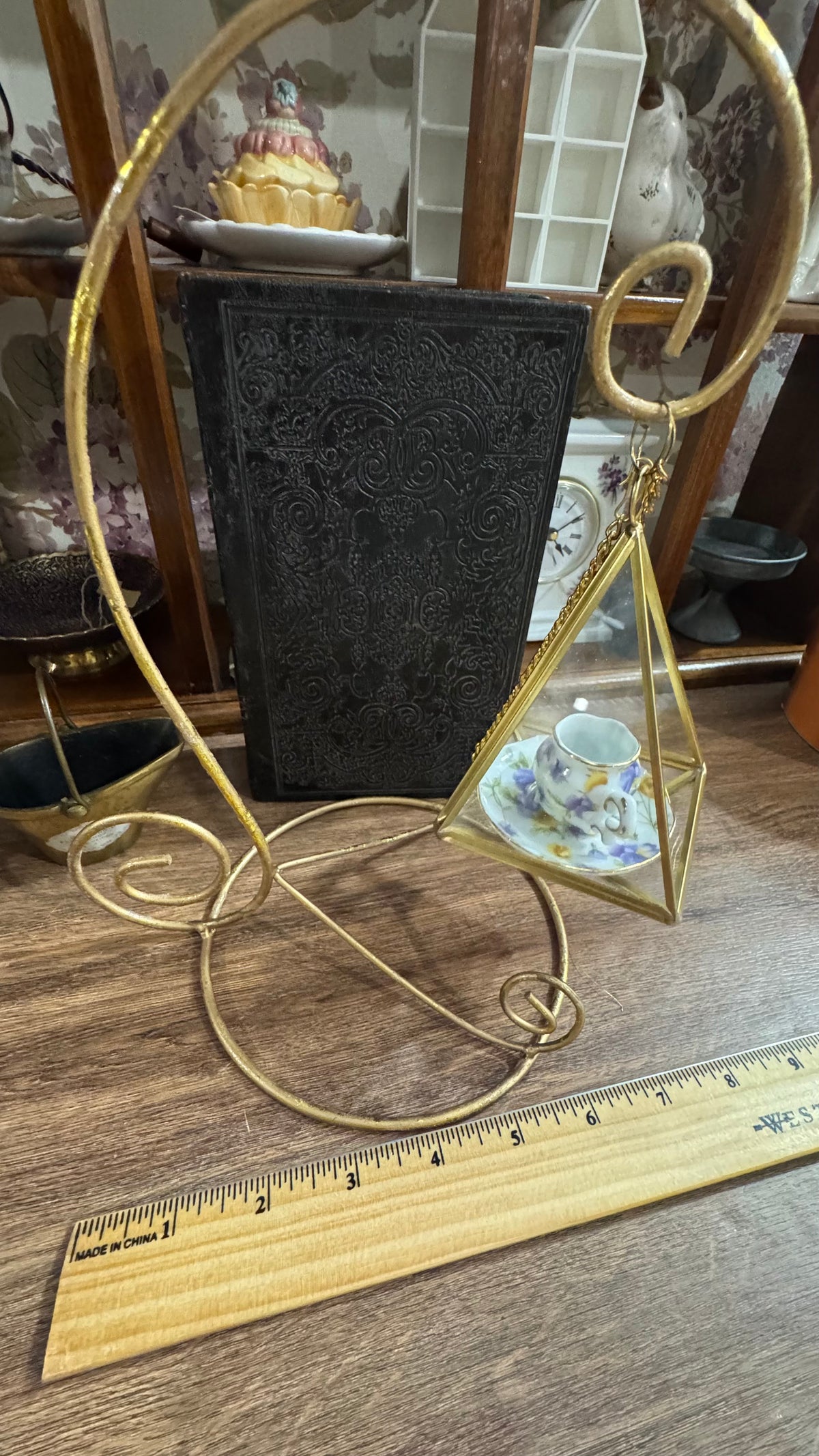 Gold Scroll Display Stand with Hanging Geometric Glass Terrarium