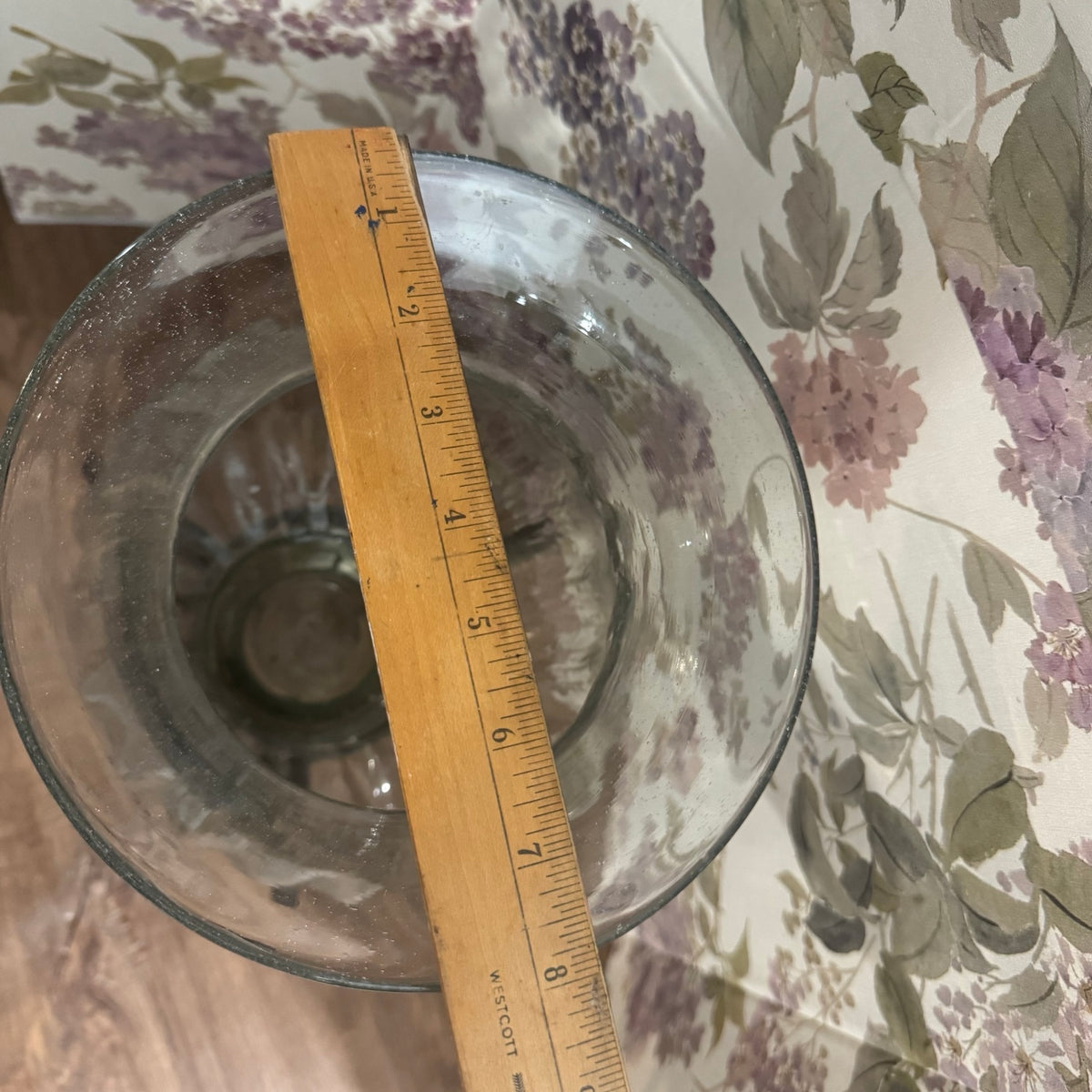 Large Glass Hurricane Vase on Wrought Iron Scroll Stand
