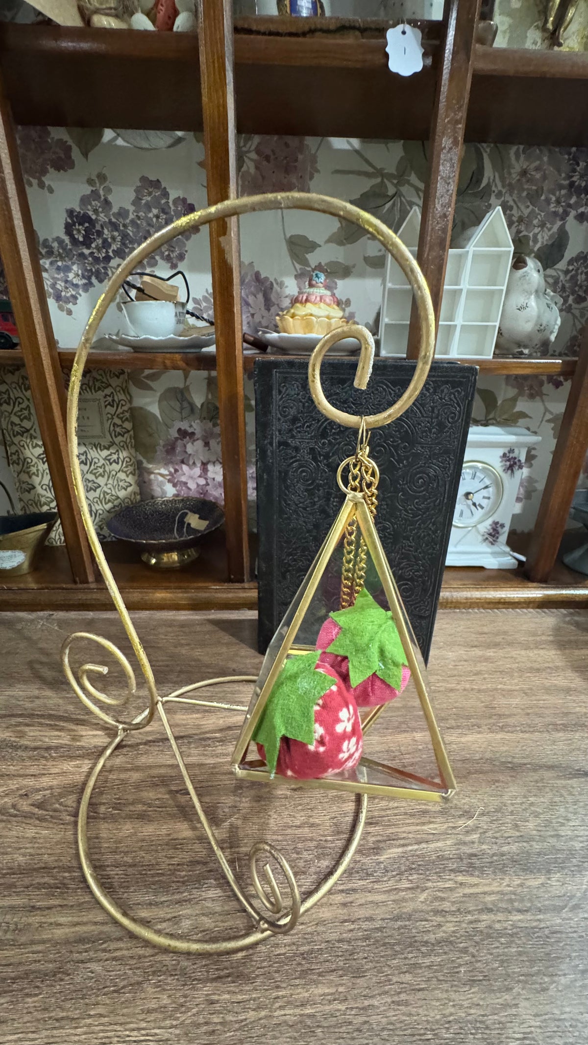 Gold Scroll Display Stand with Hanging Geometric Glass Terrarium