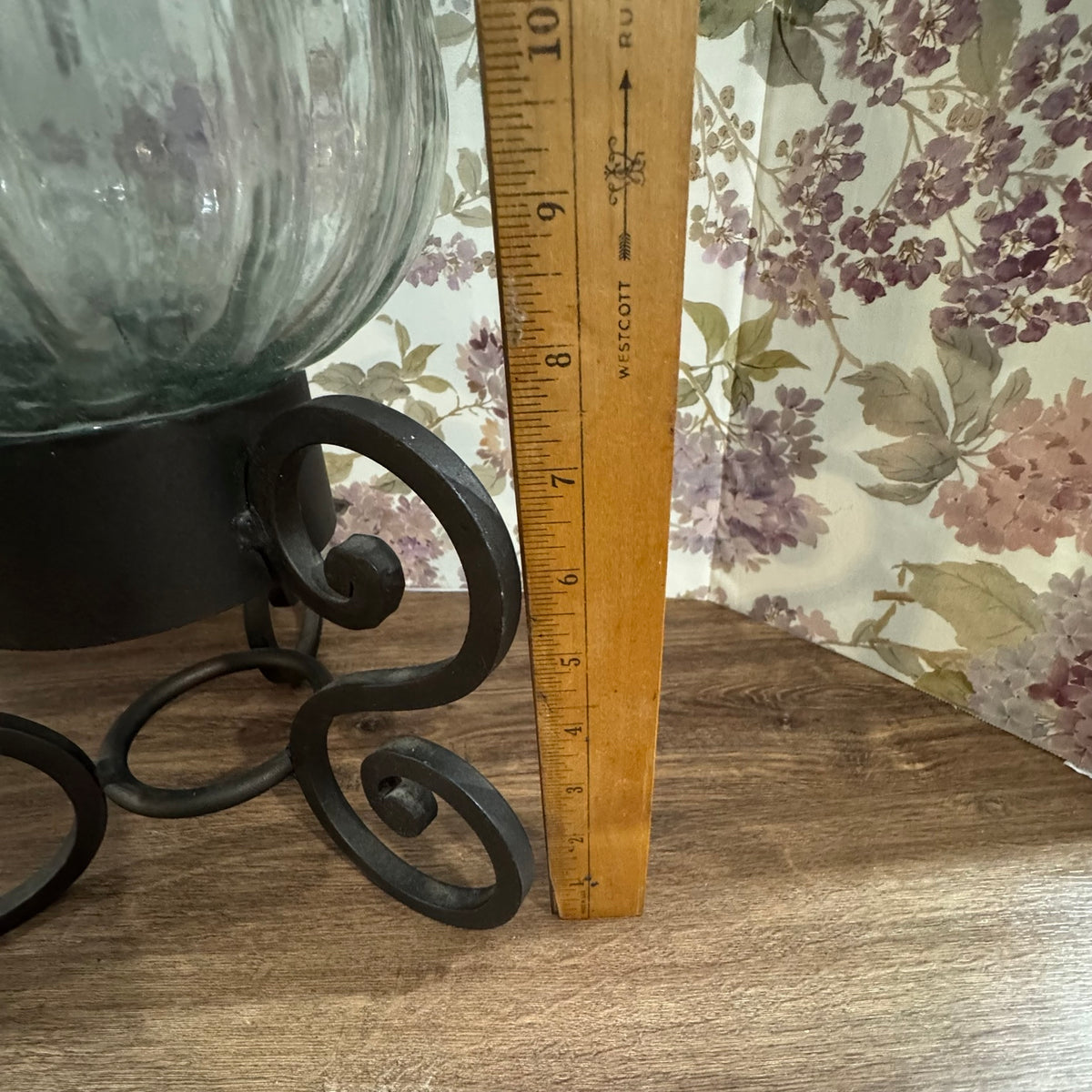 Large Glass Hurricane Vase on Wrought Iron Scroll Stand