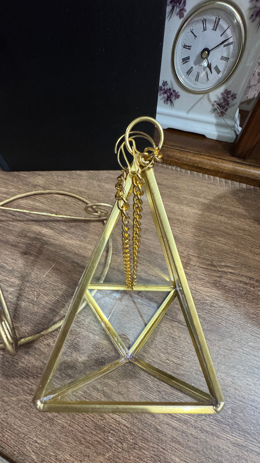 Gold Scroll Display Stand with Hanging Geometric Glass Terrarium