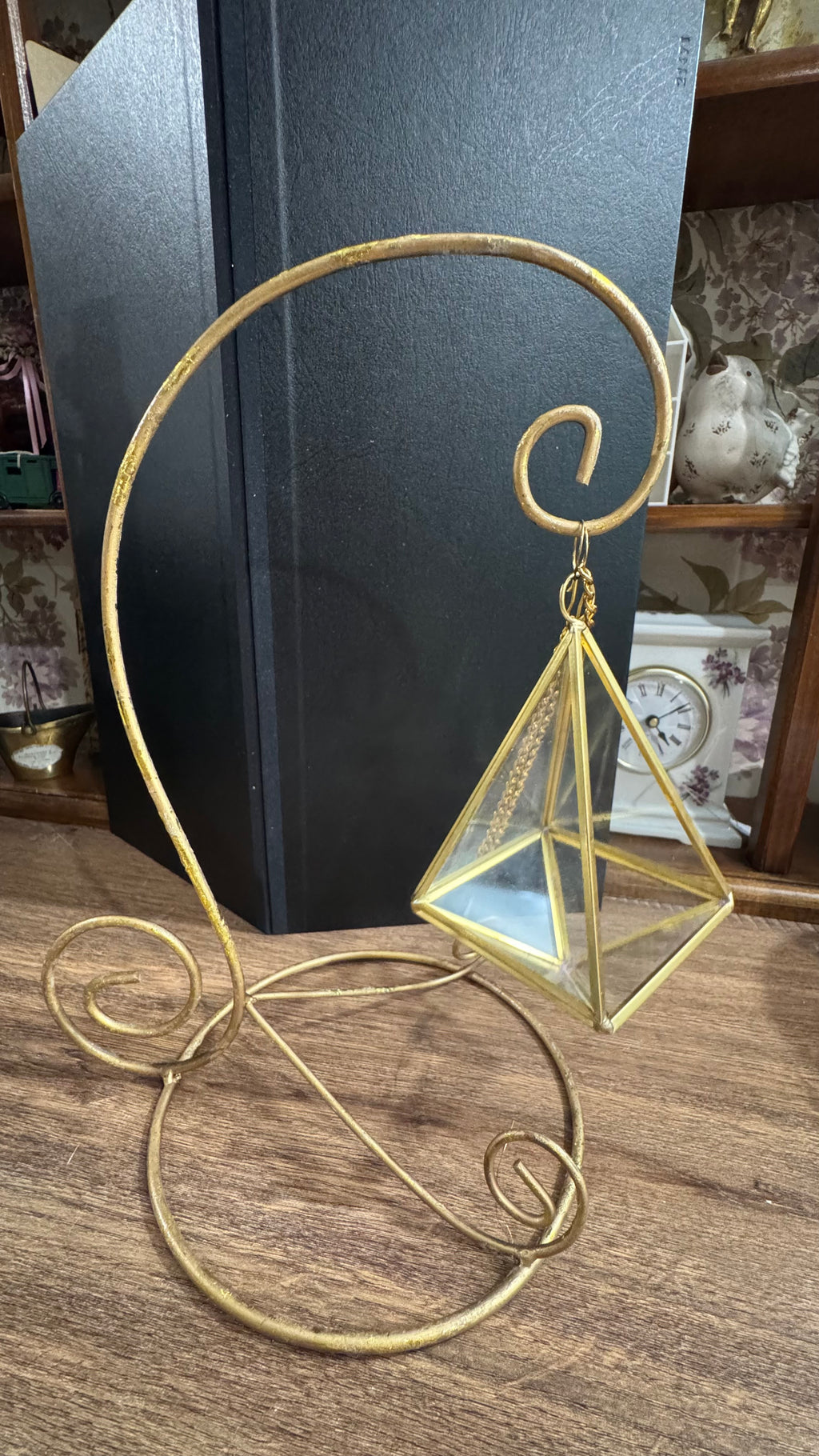 Gold Scroll Display Stand with Hanging Geometric Glass Terrarium