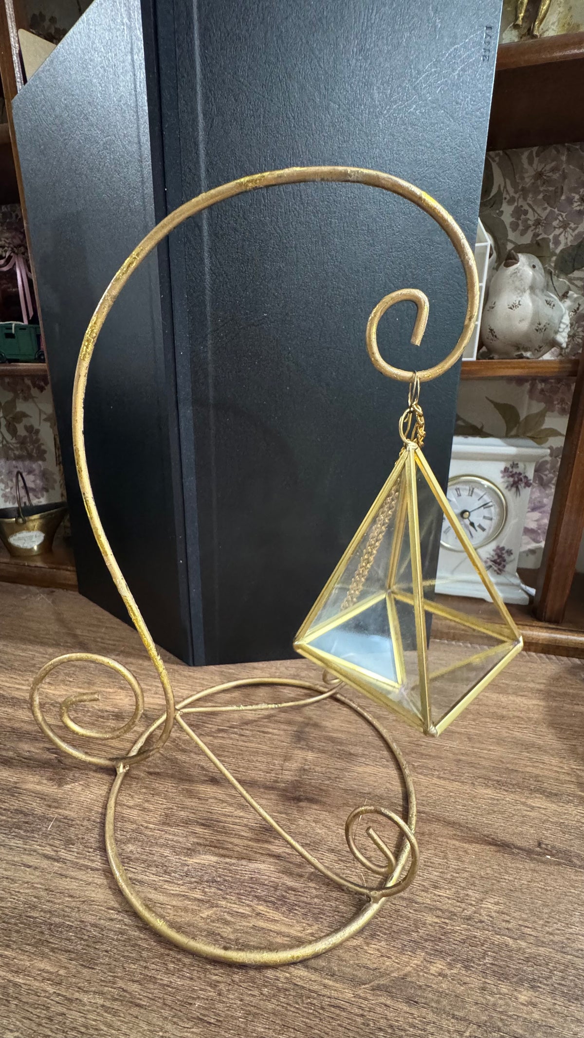 Gold Scroll Display Stand with Hanging Geometric Glass Terrarium