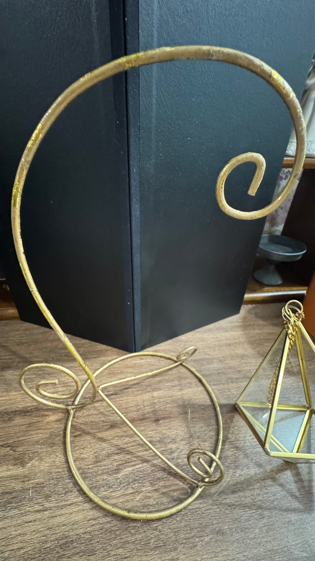 Gold Scroll Display Stand with Hanging Geometric Glass Terrarium