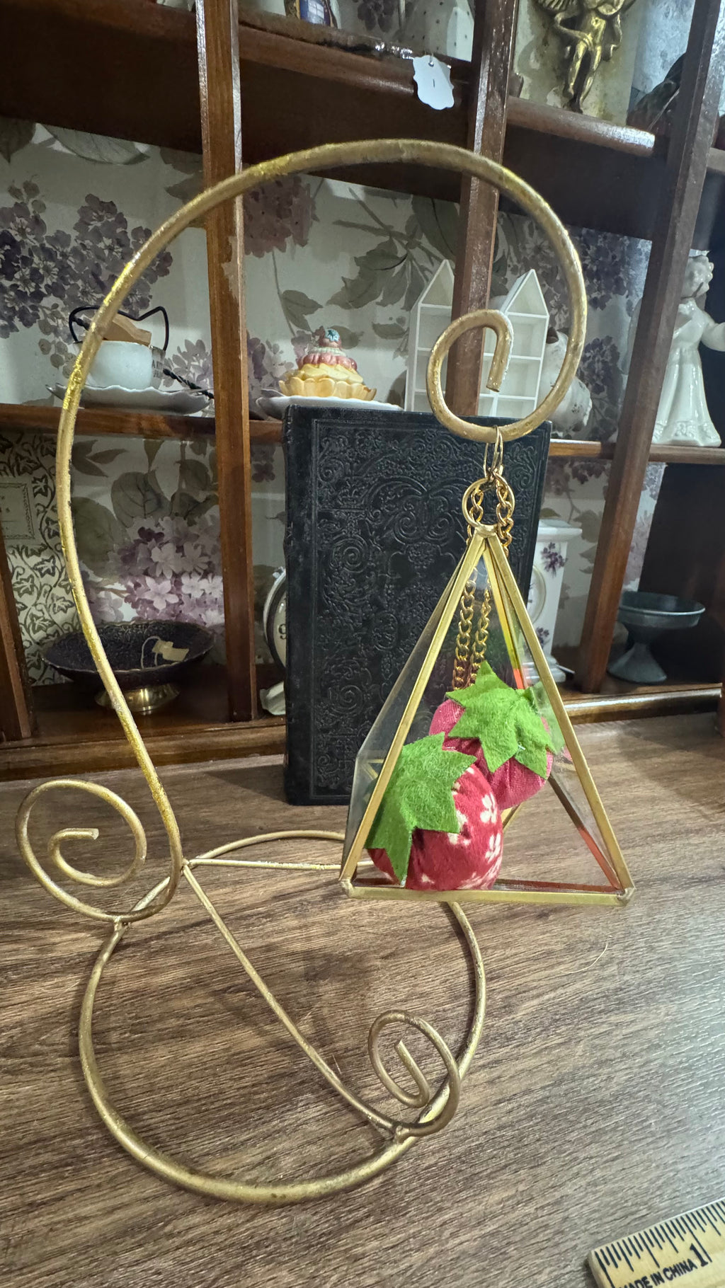 Gold Scroll Display Stand with Hanging Geometric Glass Terrarium