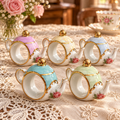 Set of 5 Cracker Barrel Porcelain Teapot Napkin Rings – Pastel Floral & Gold Trim – Boxed